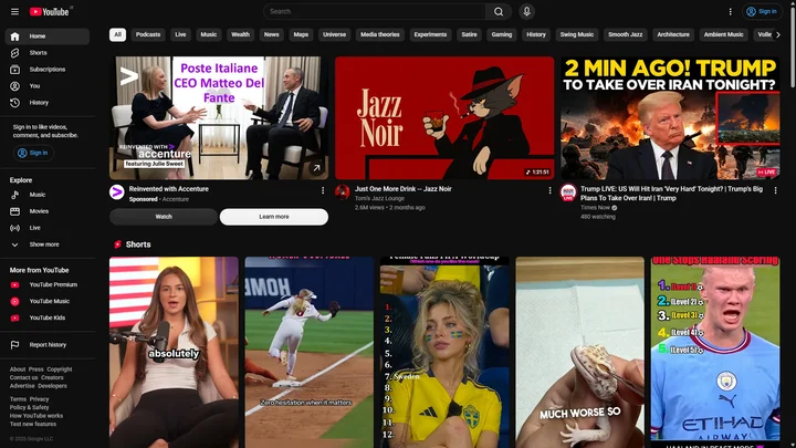 YouTube’s default homepage showing three large recommendations across the first row