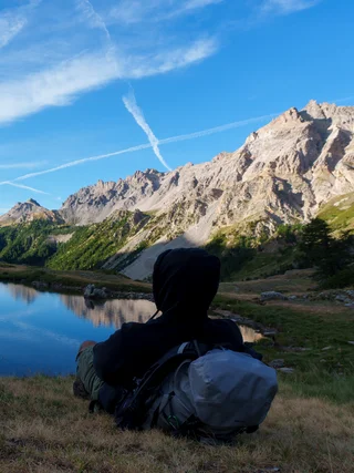 Raul Carini looking out at a mountain skyline at sunrise, Italy